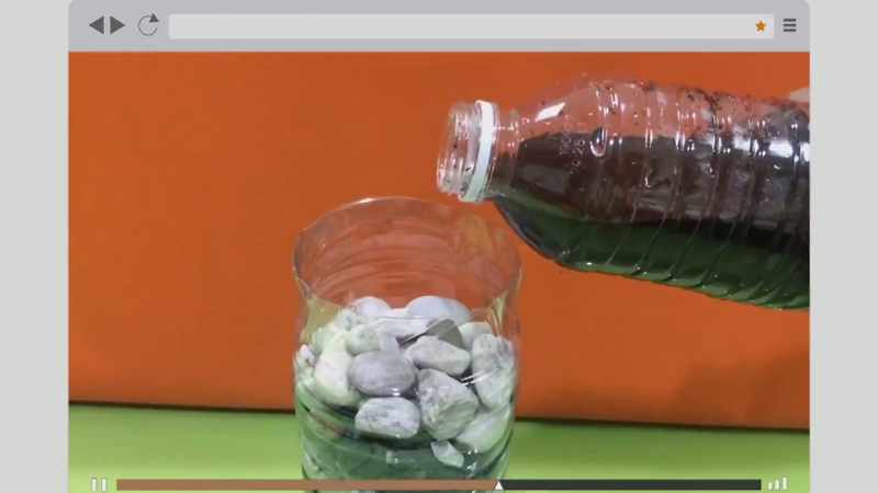 Fill two-thirds with charcoal and rocks