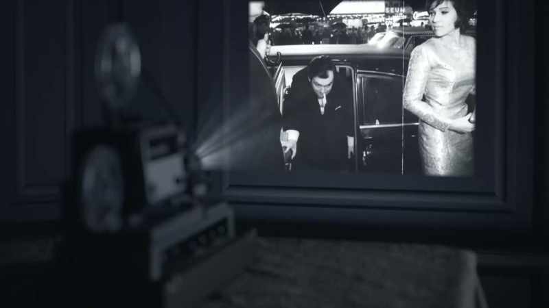 [film camera rolling]