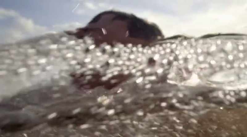 Finally, his brother pulls him to shore
