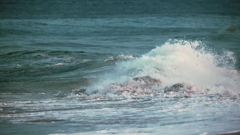 Finally, the swells grow too powerful