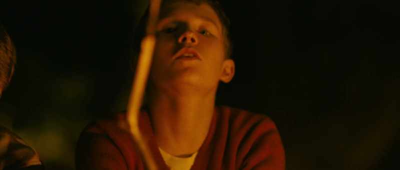 [fire crackles] -[indistinct speech]