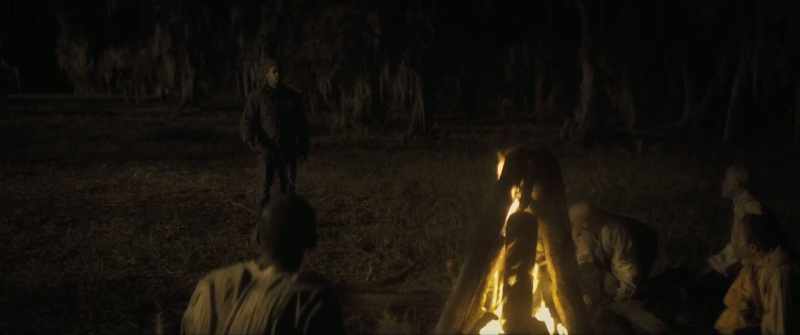 [fire crackles]