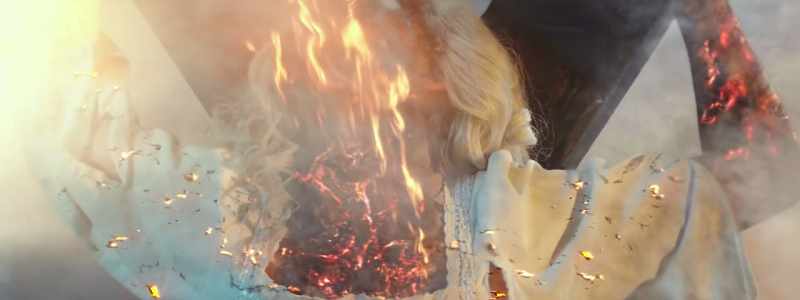 (fire crackling) (Mina screaming)