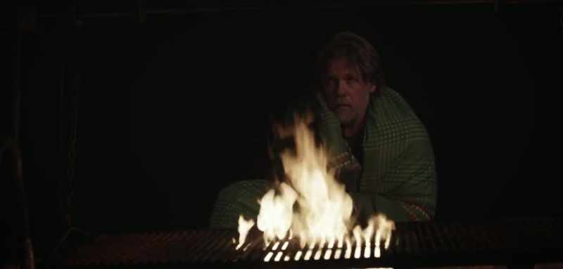 (fire crackling) (pensive music)
