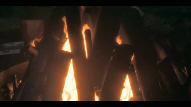 [fire crackling]