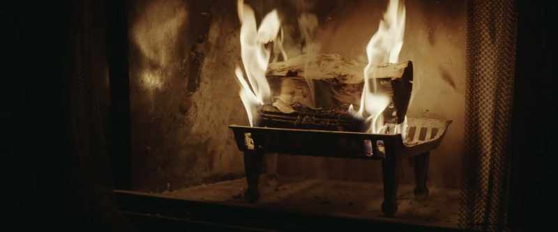 [fire crackling]