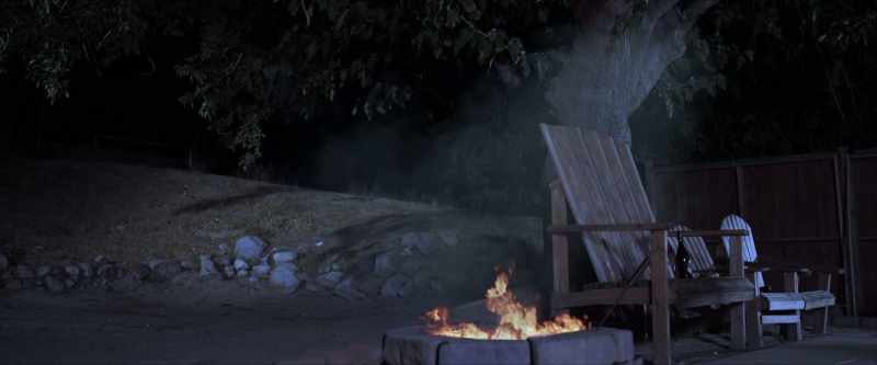 [fire crackling]