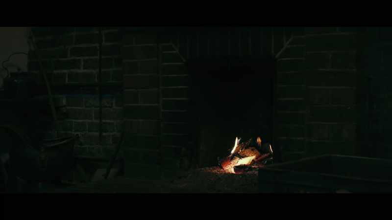 [fire crackling]
