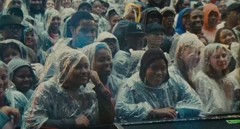 Five thousand black people chilling in the rain