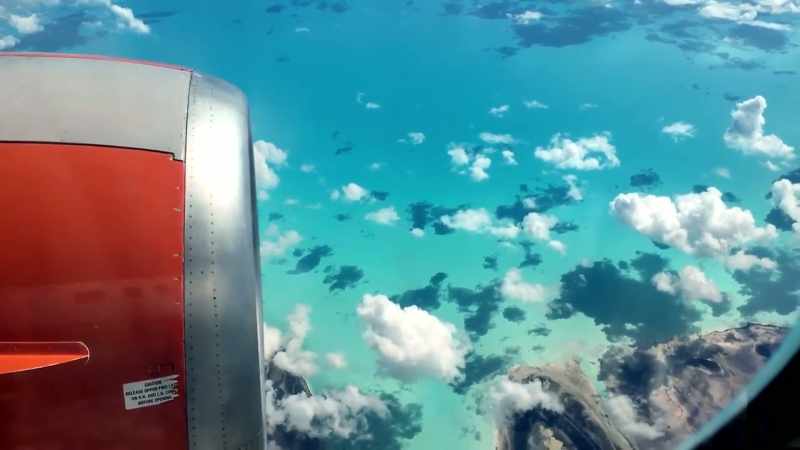 Flying over the islands from Miami