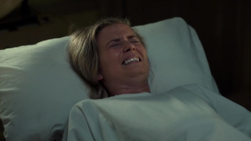 SHE GROANS