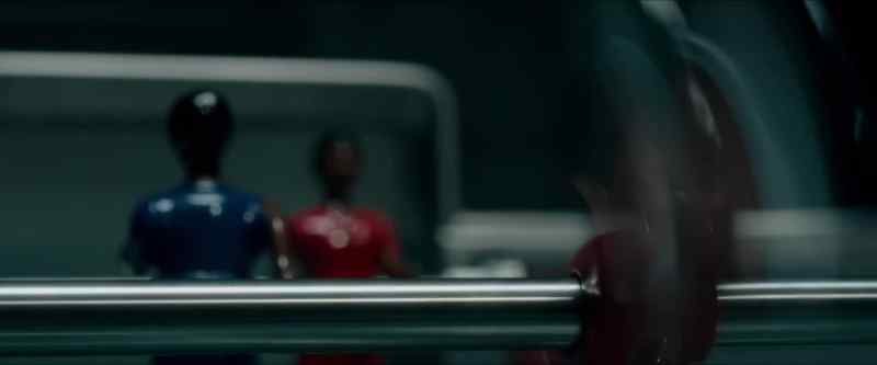 [foosball players spin rapidly]