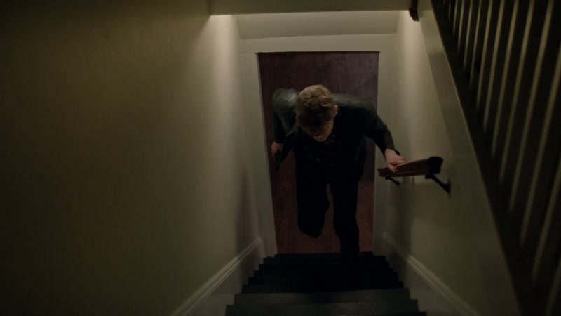 [footsteps clomping]