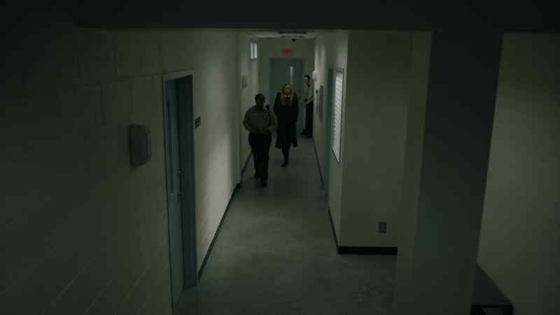 [FOOTSTEPS ECHOING SLOWLY]