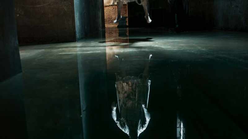 [footsteps splashing]