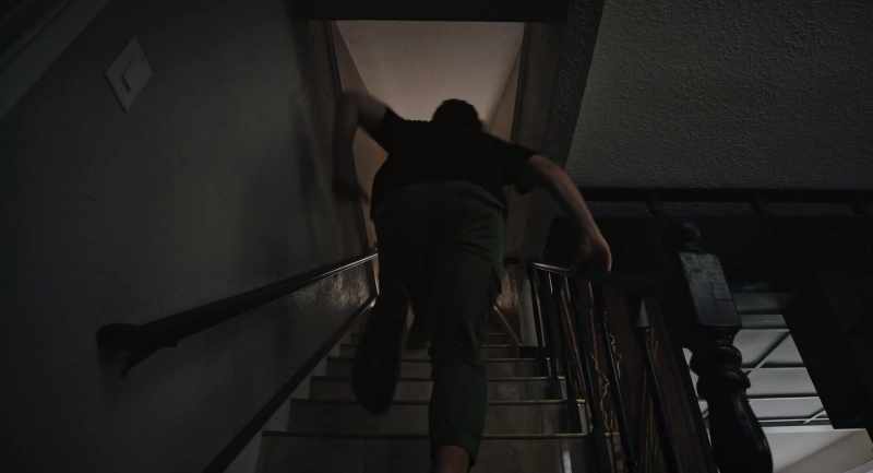 (footsteps thudding)