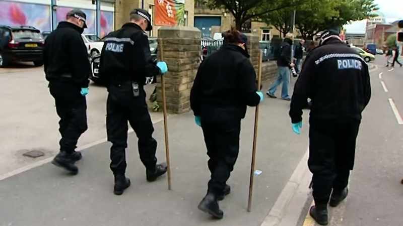 Forensic teams painstakingly searching Griffiths' flat