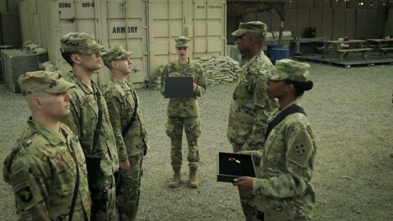 Four enemy combatants dressed in the uniforms
