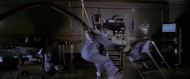 Four mechanical arms welded right onto his body