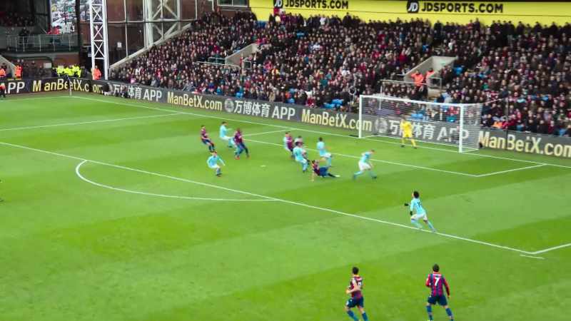 Free kick in, headed away by De Bruyne. [mumbles]