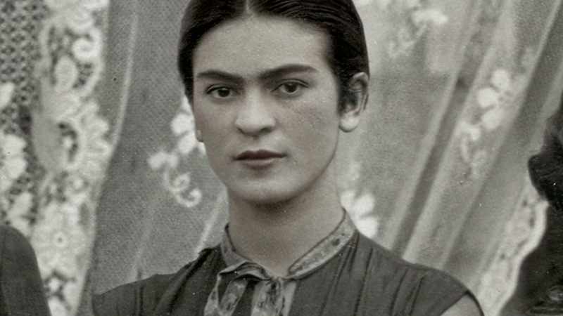 Frida was standing in a hallway dying of laughter