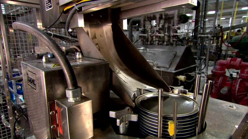 FROM THE FILLING MACHINE TO A LID DISPENSER