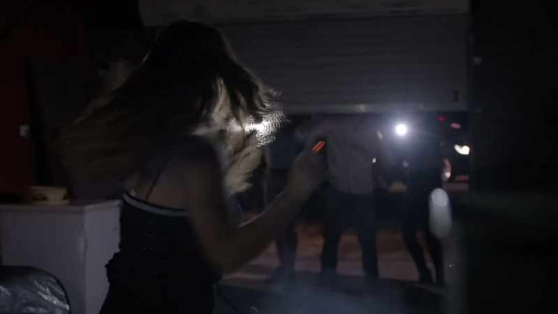 [ Garage door opens ]