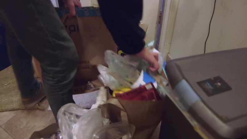 [garbage rustling]