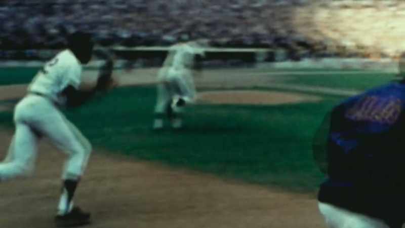 Garrett has the ball, the throw to first