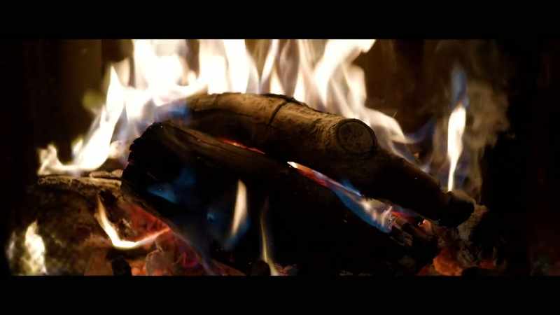 (gentle country music) (fire crackling)