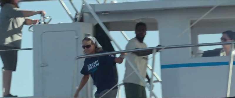 Get her as close to the boat as possible. - Cut the engine