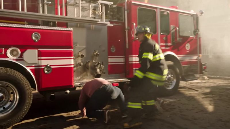 Get under the trucks! Under the trucks! Now!