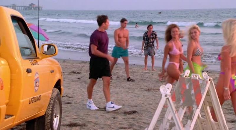 [GIRLS LAUGHING ON BEACH]