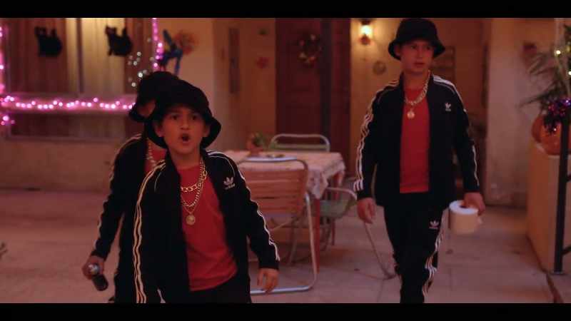 Give us the candy or we'll kick your pompis