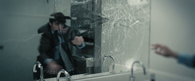 [glass shatters]