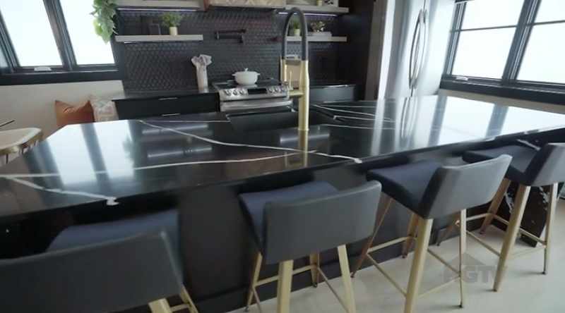 Gold accents, even the chairs are a feature