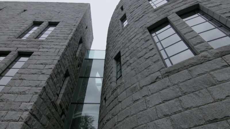Granite, steel and glass sit between the old sections