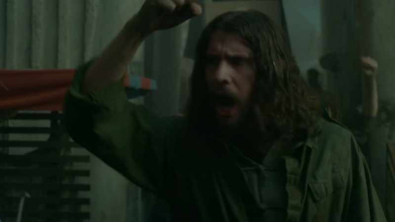 Green jumpsuit, he's angry, but it's... internalized