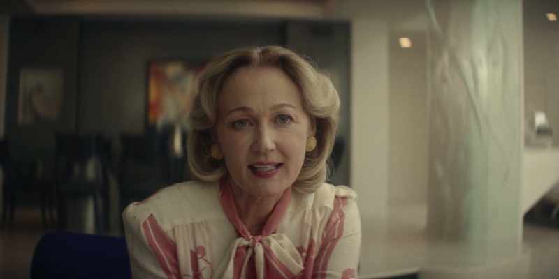 Greta's got a brownish shade on her lips and lids