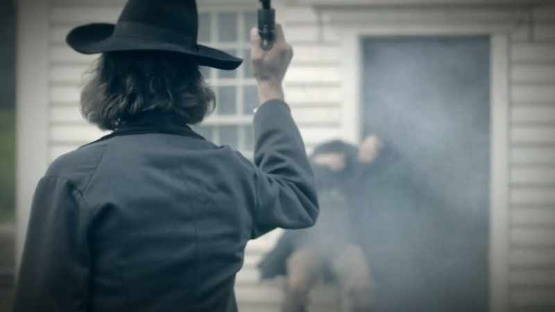 Grimes was shot five times and falls dead