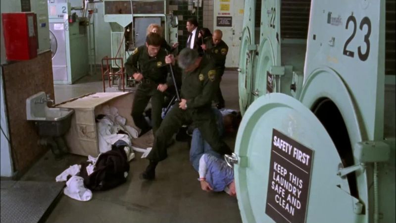 GUARD 1: On the ground! GUARD 2: Now!