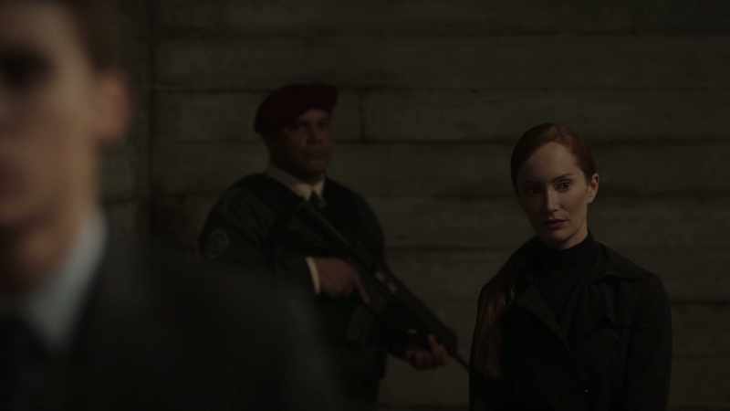 [GUARD SPEAKS GERMAN]