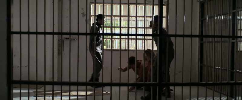 GUARD: (SPEAKS IN THAI)