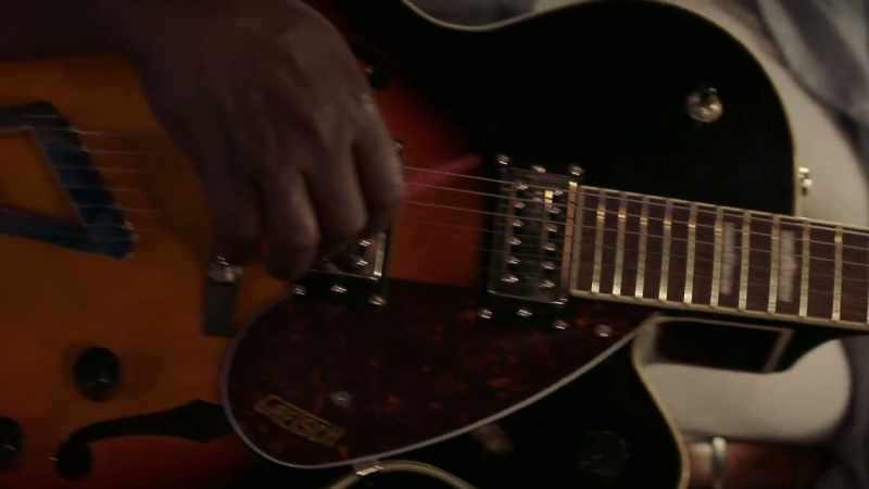 [guitar music]
