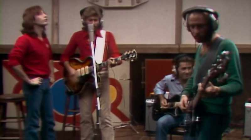 [guitar strumming]
