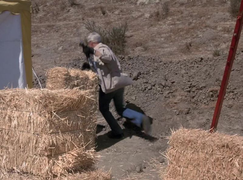 [gun firing]