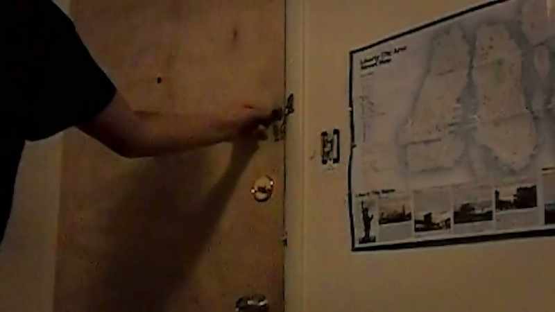 �Gun in hand, James locks the door