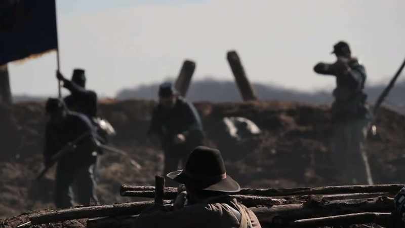 (guns firing)