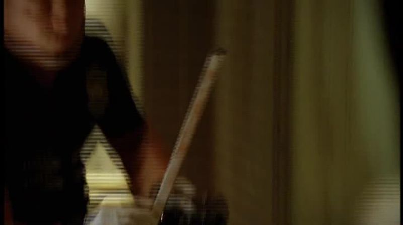 Guy has a knife and a gun