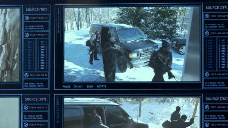 Guys in masks with automatic weapons